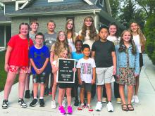 Panther students living on Windflower Bend in Dakota Dunes gathered for their annual first day of school picture at the bus stop on Monday, August 19. Back row from left: Bennet Combs, Mike McCarthy, Rachel Hersom, Sage Agrimson, Nora Agrimson, and Addison McCarthy. Middle Row from left: Eliana Corporon, Max Corporon, Harper Combs, Kendi, Dylan Li, and Briella Agrimson. Front Row from left: Hadlee Combs, and Preston Li. See more photos on page 10. Submitted photo