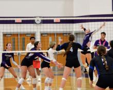 DV’s Sammy Kimbell takes a big swing at the net against EPJ on Sept. 5th. The rest of her team was ready to defend, but Kimbell got the kill and the point. Photo by Kelly Riibe • times2reporter@gmail.com