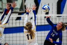 Bentlee Kollbaum, senior #14 for EPJ, hits a kill for her team against Canton. Photos by Peterman Sports Photography • stevepeterman5@gmail.com