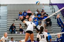 Emersen Mead goes up for the kill against Canton on Thursday, Sept. 19. Photo by Peterman Sports Photography • stevepeterman5@gmail.com
