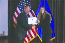 Danica Euliss, a Dakota Valley High School junior receives her certification of completion from the FBI's Youth Leadership Program in Quantico, VA. Submitted photo