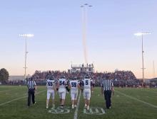 The Panther football captains take the field at Lennox on Friday, September 27th. Note the planes overhead that did a flyover during the game. Submitted photo