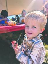 Beckett Ginkens, of Dakota Dunes, enjoyed pumpkin painting at the Fall Festival on Oct. 6, 2024. Photos by Kelly Riibe times2reporter@gmail.com