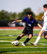 Panther senior Mark Wren goes for the ball against a Groton opponent on October 5, 2024.