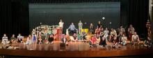 The cast and crew gather on the stage to rehearse the DV’s 3-act play. Submitted photos