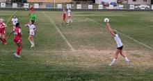 DV’s Ella Chamberlain (#18) throws the soccer ball into her teammates in the match versus Vermillion on Oct. 3, 2024. Photo by Kelly Riibe • times2reporter@gmail.com