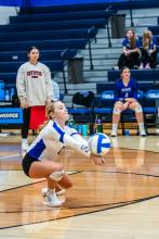 Kaitlyn Van Roekel, playing the libero position for the Huskies, goes to pass the ball versus SSC. Photo by Peterman Sports Photography • stevepeterman5@gmail.com
