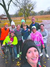 Friends and locals joined Katy Brown on November 2-3, 2024 for her running event to benefit flood victim Kathy Roberts. Back Row from left: Phil Breed, Kary Collette, Jamison Gould, and Steve Cross. Middle Row from left: Kathy Roberts, Courtney Gould, Jonathon Gould, Stacy Shrunk, and Daniela Fischer. Front: Katy Brown. Submitted photo