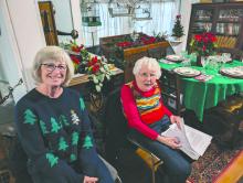 Vikki Jacobs (left), of North Sioux City, and Anne Shaner (right), of Sioux City, shared historical information with guests who visited the Shay-Adams House on November 9th.