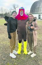 Residents of Dakota Dunes, Katy and Jaycie Rush, were at the Turkey Trot this past Thanksgiving. The volunteer fun run took place at Adams Homestead and Nature Preserve and donations of non-perishable food items were collected by the Missouri River Runners. From left: Jaycie Rush, Phil Breed, and Katy Rush. Submitted photo