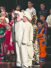 Ayse Bonstead, a 1st grader at DV, delivers his line as the Easter Bunny vying for Santa’s job during the Panther’s holiday program on December 12, 2024.
