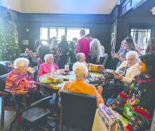 Dakota Valley student council members, in 4th-8th grade, visited StoneyBrook Suites Assisted Living Center in Dakota Dunes on December 16, 2024. The students passed out donated gifts to the residents and also stayed awhile to chat and visit.