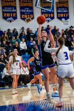 Ashley Brewer puts up a basket over her Canton defender on Thursday, December 12th. Photos by Peterman Sports Photography • stevepeterman5@gmail.com