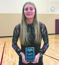 Bentlee Kollbaum holds her All-Star plaque. Submitted photo