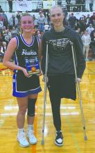 Bentlee Kollbaum, an EPJ senior basketball player, was named player of the game at the Midwest Miracle Classic on Saturday, January 4, 2025. From left: Bentlee Kollbaum, and Tourney Director Kobee Sherman. Submitted photo