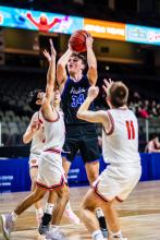 Landon Johnsen battles through traffic on offense for EPJ on Dec. 21, 2024.