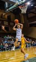 Luke Bruns went hard to the basket against Gehlen Cathlic on January 11th.