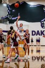 Ella Otten drove the lane and pulled up for a jumper during the January 24th home game.