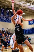 Grady Ramos drives through the lane for a shot on Saturday, March 8, 2025. Photo by Peterman Sports Photography stevepeterman5@gmail.com