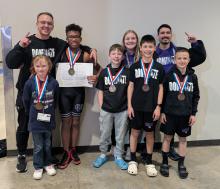 Panther youth wrestling brought home 6 medals from the state wrestling tournament in Rapid City on March 28-30, 2025. Placewinners are seen here with their coaches. Back row from left: Coach Nic Madison, Dre Connell, Kenzie Scott, and Coach Adrian Jurado. Front row from left: Khloie Willi, Graham Riibe, Glen Sellers, and Henry Reis. Photo by Kelly Riibe • times2reporter@gmail.com