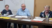 Voting for some area residents took place at city hall in Jefferson on April 8, 2025. Polling workers were on-site to assist voters. From left: Janna Whitlock, Dan Whitlock, and Susie Collins. Photo by Kelly Riibe • times2reporter@gmail.com