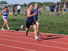 Senior Preston Konopasek ran a strong race in the boys 300m hurdles at the 2025 First Dakota Relays. He is seen here passing competition from Sioux Falls Christian and EPJ.