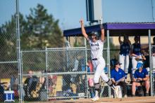 Sophomore Madie Munch celebrates as she crosses home in DV’s big win versus the West Central Trojans. Photo by Peterman Sports Photography • stevepeterman5@gmail.com