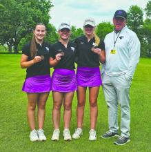 All three of the DV girls golfers who qualified for state came home with a medal. From left: Addicyn Sailer, Claire Wiebelhaus, Katie Betsworth, and Coach Rodd Slater. Submitted photo
