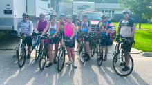 Greg and Kelly George, of Elk Point, rode in RAGBRAI 2025 with Amanda and Jeremy Vande Zande of Jefferson. The two couples were with a group of other bicyclists from Iowa and Wisconsin. This photo was taken in Cedar Falls, IA which was the starting point for Day 6 of 7 on the route. From left: Kelly George is 4th from the left, Amanda Vande Zande is 5th from the left. Greg George is 7th from the left. Jeremy Vande Zande is on the far right of the photo. Submitted photo