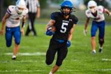 Senior Beau Schmitz is in for a touchdown during EPJ’s home opener game against Parker. Photo by Peterman Sports Photography • stevepeterman5@gmail.com