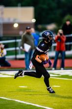 Panther 10th grader Tyler Kloucek carries the ball on a kickoff return on Friday, September 5, 2025.