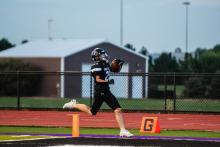 Tymond Brown Jr. is seen here scoring a touchdown for DV in the game versus Lakota Tech. Photo by Peterman Sports Photography • stevepeterman5@gmail.com
