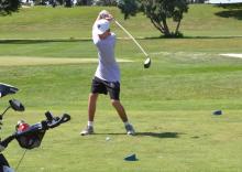 Sophomore Atticus Slater hits a nice shot while golfing in the Panther Invite in Dakota Dunes.