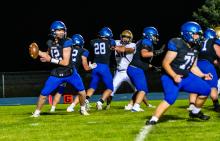 Ben Trudeau, #12 for EPJ, threw a touchdown pass versus Flandreau. Photo by Peterman Sports Photography • stevepeterman5@gmail.com