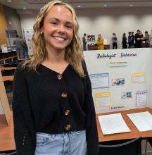 Panther senior Bria Perryman spoke about her internship at the Dunes Surgical Hospital, on December 19, 2025, for the DV Intern Showcase. Photo by Kelly Riibe • times2reporter@gmail.com