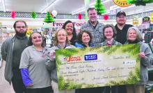 Jones’ Food Center and First Dakota Bank presented a donation to the Elk Point Food Pantry following the November round‑up campaign. Back row, from left: Donavan Wilson, Amanda Beringer, First Dakota Bank manager; Gregg Peters, Jones’ Food Center owner; and Joe Hall, Jones’ Food Center manager. Front row, from left: Tina Wilson, Mary Nelson, Tam Edwards, Elk Point Food Pantry manager; Twila Woehl and Jan Brusseau. Photo by Shannon Jost • timesleader1@gmail.com