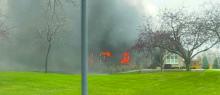 Firefighters from North Sioux City, South Sioux City and Sergeant Bluff battled a blaze at a home on 695 Cherry Hills Lane in Dakota Dunes on Nov. 26, 2025. Crews rescued three dogs from inside the residence, and no residents were home at the time of the fire. Submitted photo