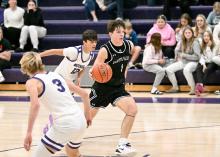 Panther senior Tatum Sorensen, who has been having a standout season for Dakota Valley, re‑corded a double‑double at the Jan. 24 Hanson Classic. He is shown competing in an early‑sea‑son game against Beresford. Photo courtesy of Squier Designs