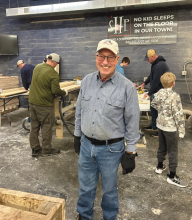 Volunteers from St. Teresa’s in Dakota Dunes, along with others from nearby parishes, helped build 30 beds at the nonprofit Sleep in Heavenly Peace on Saturday, March 7, 2026. Dave Young, a parishioner at St. Teresa’s in Dakota Dunes, volunteers often for the church and helped build beds.