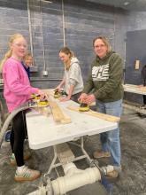 Church volunteers from Elk Point‑Jefferson helped construct 30 beds at Sleep in Heavenly Peace in Sioux City on March 7. Back row, from left: Holly Schmitz and Nora Schmitz. Front row, from left: Elise Schmitz and Cara Norby. Submitted photo