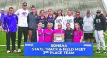 Dakota Valley claimed a third‑place team finish at the Class B state meet on May 30, 2026. Back row, from left: Coach Kaleb Martin, Coach Ben Blaeser, Claire Munch, Julia Bernard, Alex McCullough, Raegan Kauffman, Kaitlyn Daschel, Head Girls Coach Tammy Lilly, Head Boys Coach Vincent Tucker and Coach Dylan Lindstrom. Front row, from left: Mia Riibe, Millie Squier, Ava Squier, Emma Honner and Mallory Riibe.       Photo by Kelly Riibe • times2reporter@gmail.com