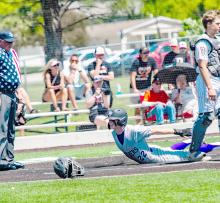 Dakota Valley’s Grady Ramos scores on an epic headfirst slide at home on Monday, May 25, 2026. Photo by Peterman Sports Photography • stevepeterman5@gmail.com