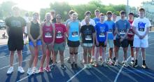 Multiple Huskies took part in the Elk Point-Jefferson cross country road race on Saturday, July 18, 2026. Back row from left: Garrett Staum, Grayson Jansen, Mason Porter, Jaxon Vande Vegte, Jaxon Steinbrecher and Noah Buhian. Front row fro left: Jayse Vande Vegte, Gracelyn Campbell, Becca Stacy, Nikki Norby, Lorelai Cluts, Ashlynn Walker, Maxwell Leuenhagen, Jack LaFerrier, Cael Derochie, Gabe Edminson Photos by Peterman Sports Photography • stevepeterman5@gmail.com