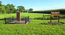 The restored Fort Brule monument stands along South Dakota Highway 50 after volunteer Larry Wilcox cleaned the granite marker, repainted the fence and refreshed the site’s signage. The landmark commemorates the 1862 frontier stockade built near Brule Creek. Photo by Shannon Jost • timesleader1@gmail.com