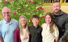 Carol Williams, who lives in Florida but spends several weeks each year in Union County, is pictured with her family. Williams recalled being at work during the 9/11 attacks and gathering loved ones as the nation absorbed the news. From left: Jesse Williams, Carol Williams, Glenn Sellers, Mandy Sellers and Rob Sellers. Submitted photo