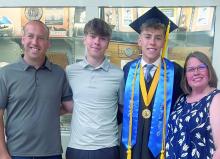 Tony and Heather Marx, of rural Jefferson, S. D., are pictured with their children, Spencer and Mason. The couple recalled hearing the news of the 9/11 attacks and how the nation watched with concern during a tragic moment in history. From left: Tony Marx, Spencer Marx, Mason Marx and Heather Marx. Submitted photo