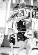 Melina Snoozy was on fire from beyond the arc against Madison Feb. 17. She’s pictured here shooting againstVermillion. Photo by Peterman Sports Photography • stevepeterman5@gmail.com