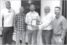 The North Sioux City Economic Development Corporation (NSCEDC) named True North Dispensary as the December Business of the Month. Pictured, from left, are NSCEDC Executive Director Andrew Nilges,NSCEDC Director John Stevens,True North Dispensary Partner Ben Nesselhuf, NSCEDC Board President Mike Huber and NSCEDC Director Dustin Pratt. Submitted photo