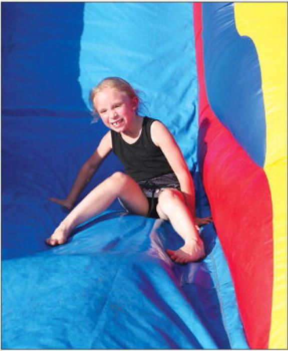 Kids were able to play on a bounce house at Immanuel Lutheran’s Family Fun Night Aug. 28. Photo courtesy of Gary Schaeffer