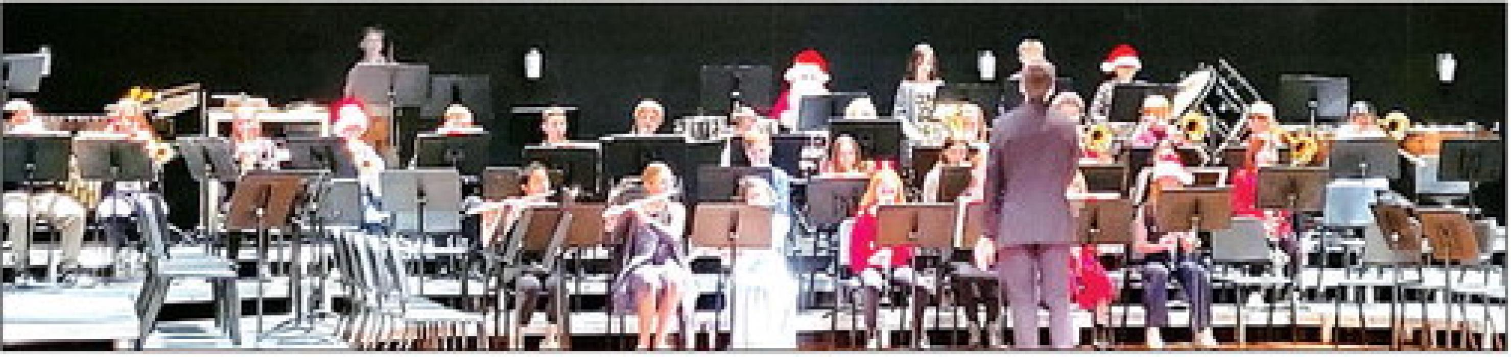The 6th grade band wore formal attire with a few members of the band adding some festive flair to their wardrobe.